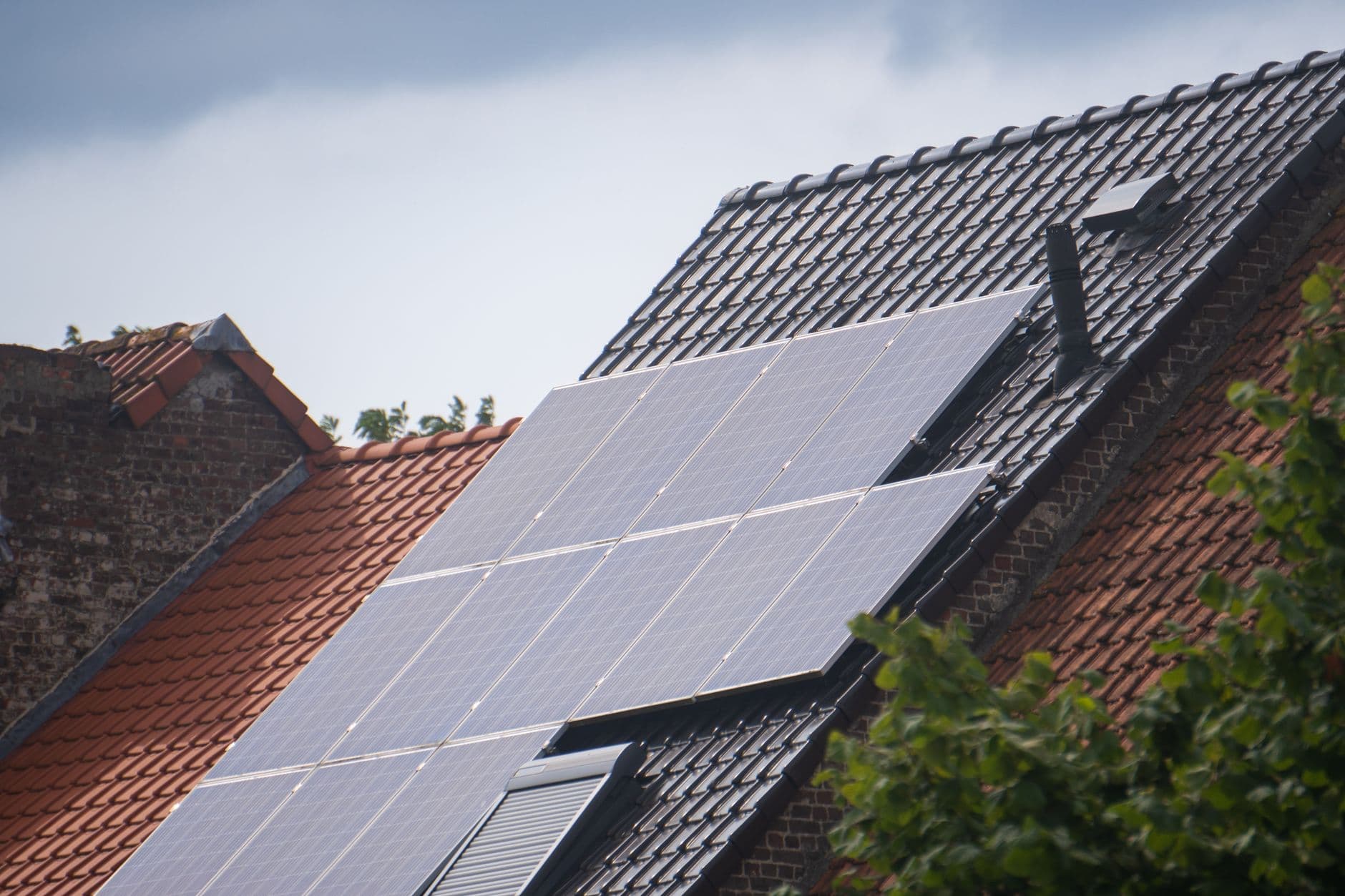Solar panels installed on a residential rooftop, showcasing eco-friendly renewable energy